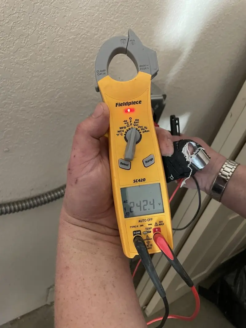 Voltage testing with clamp meter during Aluminum Wiring Replacement in Bayou Vista